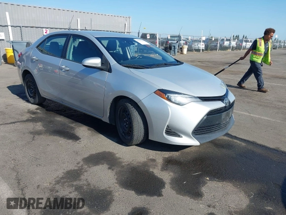 2018 Toyota Corolla L with VIN 2T1BURHE8JC079085, listed as a IAAI auction lot 42495026 with 376,657 mi miles and . Bid and sale history available at DreamBid. Image 1.