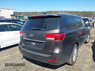 2017 Kia Sedona LX with VIN KNDMB5C14H6329340, listed as a IAAI auction lot 41803814 with 106,672 mi miles. Bid and sale history available at carsss.com. Image 4.