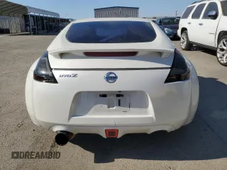 2012 Nissan 370Z с VIN JN1AZ4EH2CM565026, выставлен на аукционе Copart как лот 56129015 с пробегом 113 456 миль миль и Списание • Salvage title. История ставок и продаж доступна на DreamBid. Изображение 6.