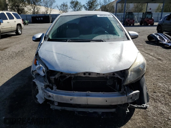 2012 Toyota Yaris L z VIN JTDJTUD36CD501205, wystawiony jako Copart lot #49529145 z przebiegiem 307 992 mil mil oraz Szkoda całkowita • Salvage title. Historia ofert i sprzedaży dostępna na DreamBid. Obrazek 5.