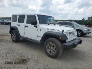 2016 Jeep Wrangler Unlimited Rubicon с VIN 1C4BJWFGXGL349057, выставлен на аукционе Copart как лот 61608945 с пробегом 118 200 миль миль и Списание • Salvage title. История ставок и продаж доступна на DreamBid. Изображение 4.