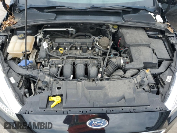 2016 Ford Focus SE z VIN 1FADP3F21GL262289, wystawiony jako Copart lot #60318515 z przebiegiem 79 529 mil mil oraz Szkoda całkowita • Salvage title. Historia ofert i sprzedaży dostępna na DreamBid. Obrazek 11.