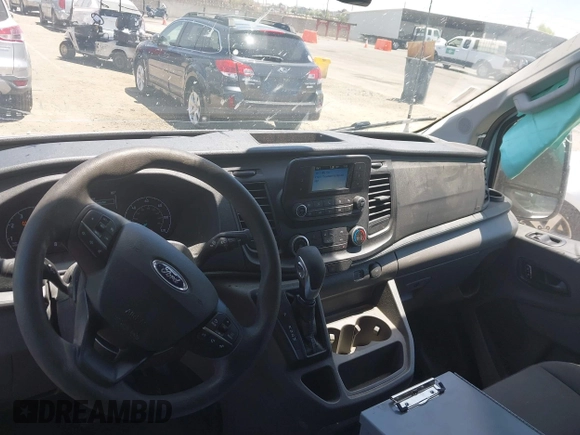2023 Ford Transit Cargo z VIN 1FTYE1Y81PKB53926, wystawiony jako IAAI lot #42514906 z przebiegiem 52 410 mil mil oraz . Historia ofert i sprzedaży dostępna na DreamBid. Obrazek 18.