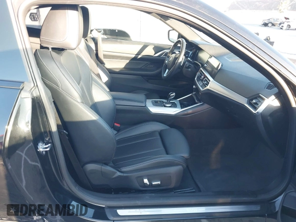 2022 BMW 4 Series 430i xDrive with VIN WBA73AP00NCJ16822, listed as a IAAI auction lot 41329235 with 30,570 mi miles and . Bid and sale history available at DreamBid. Image 5.