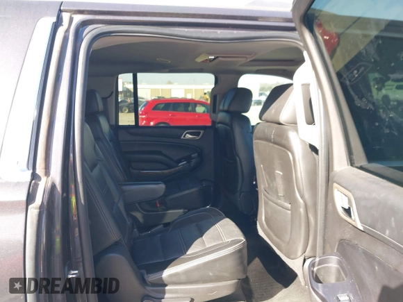 2015 GMC Yukon XL Denali with VIN 1GKS2JKJ9FR634771, listed as a IAAI auction lot 41676218 with 73,271 mi miles. Bid and sale history available at carsss.com. Image 8.