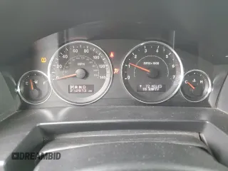 2010 Jeep Commander Sport with VIN 1J4RG4GK5AC119433, listed as a Copart auction lot 87657265 with 212,973 mi miles and Salvage title. Bid and sale history available at DreamBid. Image 9.