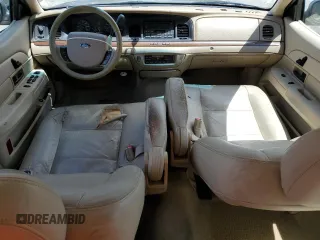 2006 Ford Crown Victoria LX z VIN 2FAFP74V56X126245, wystawiony jako Copart lot #56598055 z przebiegiem 91 400 mil mil oraz Szkody całkowita. Historia ofert i sprzedaży dostępna na DreamBid. Obrazek 8.