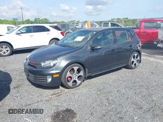 2011 Volkswagen GTI w/Sunroof & Navi PZEV z VIN WVWGD7AJ7BW070534, wystawiony jako IAAI lot #42159521 z przebiegiem 138 279 mil mil oraz . Historia ofert i sprzedaży dostępna na DreamBid. Obrazek 2.