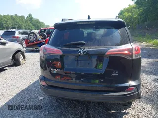 2017 Toyota RAV4 LE with VIN 2T3BFREV5HW651308, listed as a IAAI auction lot 42701783 with 112,829 mi miles and . Bid and sale history available at DreamBid. Image 16.