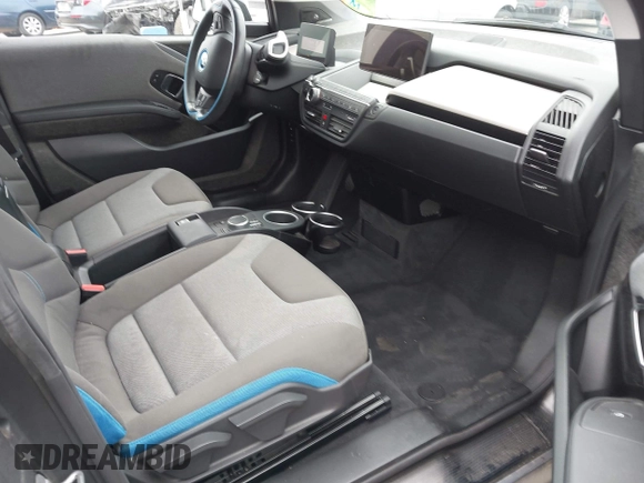 2019 BMW i3 z VIN WBY8P4C54K7E83372, wystawiony jako IAAI lot #42055886 z przebiegiem 22 230 mil mil oraz . Historia ofert i sprzedaży dostępna na DreamBid. Obrazek 5.