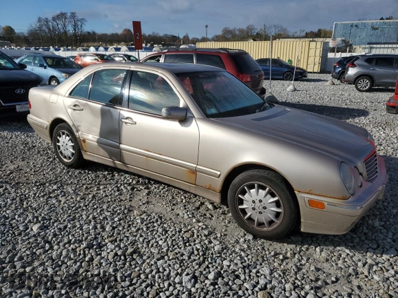 2002 Mercedes-Benz E-Class with VIN WDBJF82J12X062460, listed as a Copart auction lot 79264964 with 113,725 mi miles and Salvage Title. Bid and sale history available at carsss.com. Image 4.