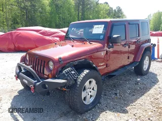 2007 Jeep Wrangler Unlimited Sahara with VIN 1J4GA59187L116585, listed as a IAAI auction lot 41996297 with 151,961 mi miles and . Bid and sale history available at DreamBid. Image 17.