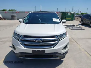 2015 Ford Edge SEL with VIN 2FMTK3J97FBC16209, listed as a IAAI auction lot 41974393 with 129,608 mi miles. Bid and sale history available at carsss.com. Image 13.