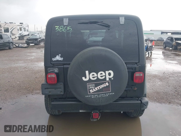 2004 Jeep Wrangler X with VIN 1J4FA39S34P753865, listed as a IAAI auction lot 41948545 with 198,169 mi miles. Bid and sale history available at carsss.com. Image 16.