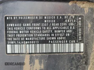2013 Volkswagen Jetta TDI z VIN 3VWPL7AJ4DM696013, wystawiony jako Copart lot #53131085 z przebiegiem 123 875 mil mil oraz Szkoda całkowita • Salvage title. Historia ofert i sprzedaży dostępna na DreamBid. Obrazek 13.