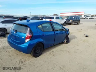 2016 Toyota Prius c One with VIN JTDKDTB34G1590133, listed as a IAAI auction lot 40962988 with 132,868 mi miles. Bid and sale history available at carsss.com. Image 4.