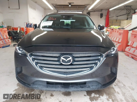 2017 Mazda CX-9 Touring with VIN JM3TCBCY1H0127229, listed as a IAAI auction lot 42320263 with 85,890 mi miles and . Bid and sale history available at DreamBid. Image 12.