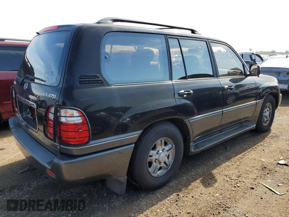 2002 Lexus LX 470 z VIN JTJHT00W923521442, wystawiony jako Copart lot #55936255 z przebiegiem 184 103 mil mil oraz Tytuł czysty. Historia ofert i sprzedaży dostępna na DreamBid. Obrazek 3.