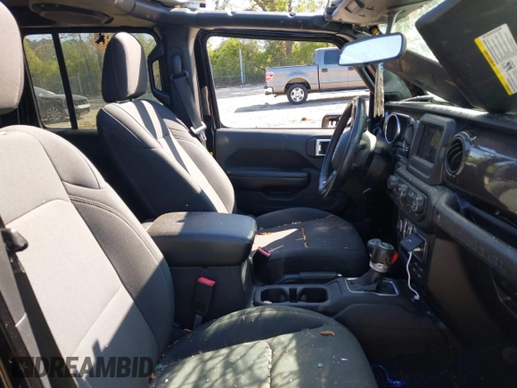 2019 Jeep Wrangler Unlimited Sport S with VIN 1C4HJXDG7KW671598, listed as a IAAI auction lot 42059734 with 63,899 mi miles and . Bid and sale history available at DreamBid. Image 5.