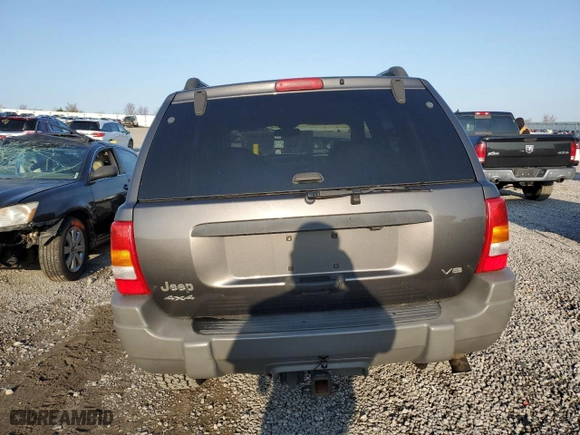 2002 Jeep Grand Cherokee Laredo with VIN 1J4GW48N32C180185, listed as a Copart auction lot 51988335 with 212,399 mi miles and Salvage Title. Bid and sale history available at carsss.com. Image 7.