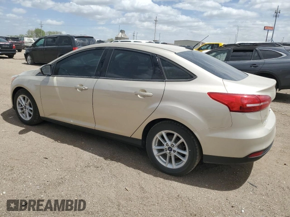 2017 Ford Focus SE with VIN 1FADP3F28HL299535, listed as a Copart auction lot 56958885 with 102,179 mi miles and Clean title. Bid and sale history available at DreamBid. Image 2.
