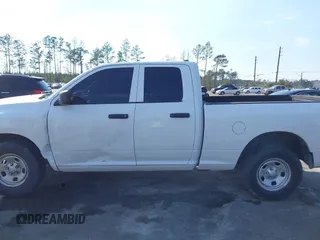 2018 Ram 1500 Tradesman with VIN 1C6RR6FG6JS347673, listed as a IAAI auction lot 41692169 with 121,631 mi miles and . Bid and sale history available at DreamBid. Image 14.