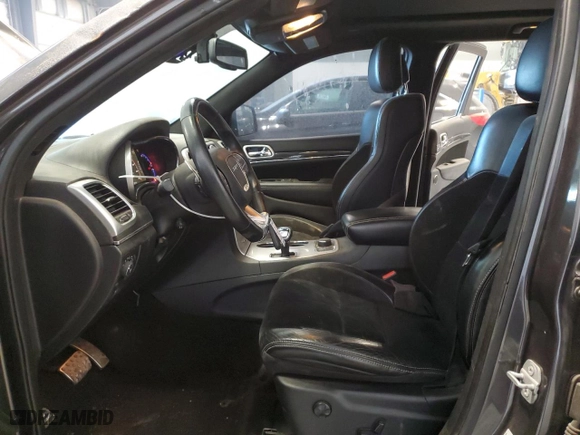 2015 Jeep Grand Cherokee SRT with VIN 1C4RJFDJ8FC752210, listed as a Copart auction lot 88773005 with 76,721 mi miles and Salvage Title. Bid and sale history available at carsss.com. Image 7.