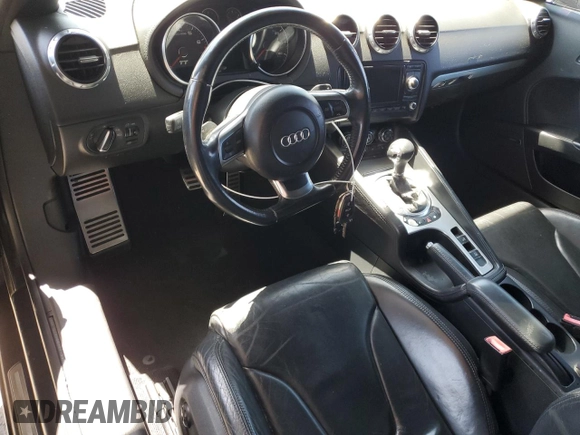 2008 Audi TT 2.0T with VIN TRUMF38J481034405, listed as a Copart auction lot 61779265 with 104,271 mi miles and Salvage title. Bid and sale history available at DreamBid. Image 8.