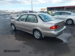 1999 Toyota Corolla VE with VIN 1NXBR12E4XZ182751, listed as a IAAI auction lot 41433066 with 56,904 mi miles and . Bid and sale history available at DreamBid. Image 3.