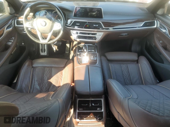 2018 BMW 7 Series 740e xDrive iPerformance with VIN WBA7J2C52JG938439, listed as a Copart auction lot 69452044 with 38,451 mi miles and Salvage Title. Bid and sale history available at carsss.com. Image 8.