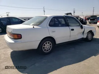 1992 Toyota Camry LE with VIN 4T1SK12E0NU077223, listed as a Copart auction lot 71787194 with 239,027 mi miles and Salvage Title. Bid and sale history available at carsss.com. Image 3.