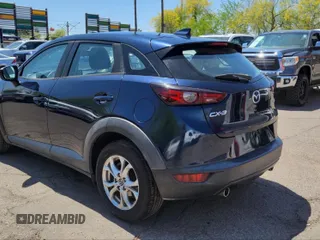2020 Mazda CX-3 Sport with VIN JM1DKDB76L1465863, listed as a IAAI auction lot 42137563 with 180,000 mi miles. Bid and sale history available at carsss.com. Image 3.