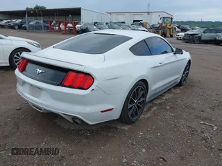 2015 Ford Mustang EcoBoost with VIN 1FA6P8TH6F5311018, listed as a IAAI auction lot 42649308 with 105,527 mi miles and . Bid and sale history available at DreamBid. Image 4.