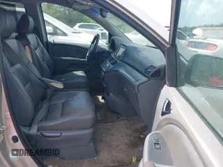 2007 Honda Odyssey Touring with VIN 5FNRL38877B002351, listed as a IAAI auction lot 41930355 with 254,929 mi miles. Bid and sale history available at carsss.com. Image 5.