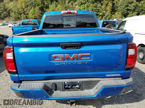 2024 GMC Canyon 4WD Elevation with VIN 1GTP6BEK7R1124406, listed as a Copart auction lot 52091565 with 9,072 mi miles and Salvage Title. Bid and sale history available at carsss.com. Image 6.