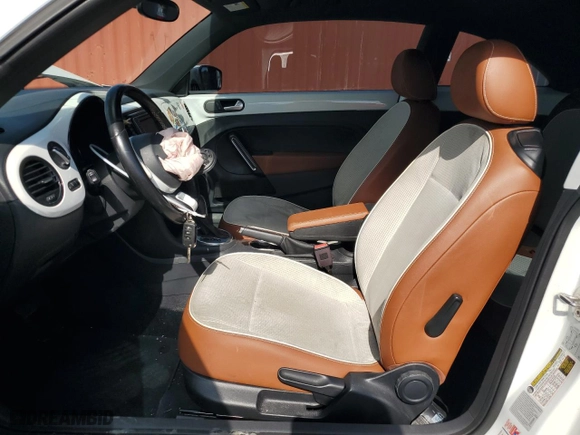 2017 Volkswagen Beetle 1.8T Fleet with VIN 3VWF17AT1HM617468, listed as a Copart auction lot 82233824 with 72,800 mi miles and Salvage Title. Bid and sale history available at carsss.com. Image 7.