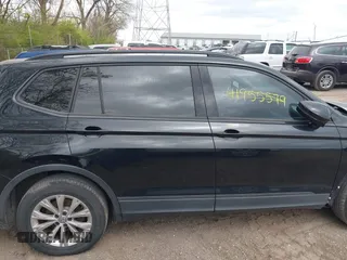 2018 Volkswagen Tiguan S with VIN 3VV1B7AX1JM076071, listed as a IAAI auction lot 42043311 with 107,883 mi miles and . Bid and sale history available at DreamBid. Image 13.