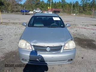 2008 Suzuki Forenza z VIN KL5JD56Z38K834698, wystawiony jako IAAI lot #40927796 z przebiegiem 187 973 mil mil oraz . Historia ofert i sprzedaży dostępna na DreamBid. Obrazek 12.