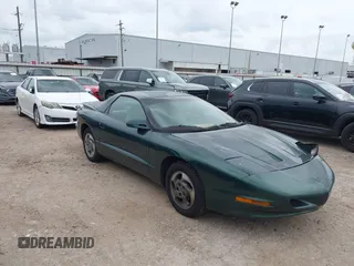 1994 Pontiac Firebird Firebird z VIN 2G2FS22S9R2217920, wystawiony jako IAAI lot #42153811 z przebiegiem 128 364 mil mil oraz . Historia ofert i sprzedaży dostępna na DreamBid. Obrazek 1.