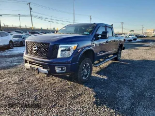 2017 Nissan Titan XD PRO-4X with VIN 1N6BA1F4XHN506954, listed as a Copart auction lot 86863864 with 61,741 mi miles and Clean Title. Bid and sale history available at carsss.com. Image 1.