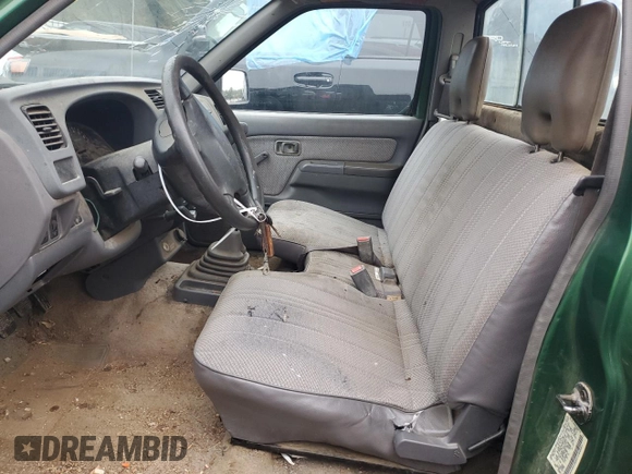 1998 Nissan Frontier XE with VIN 1N6DD21S8WC303274, listed as a Copart auction lot 79755584 with Not provided miles and Salvage title. Bid and sale history available at DreamBid. Image 7.