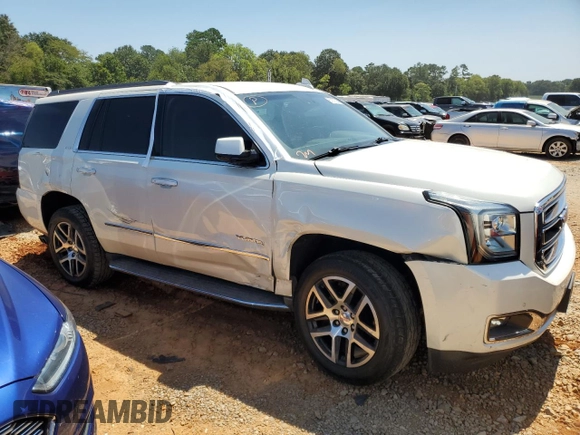 2015 GMC Yukon SLT with VIN 1GKS2BKC1FR736203, listed as a Copart auction lot 67977694 with 178,781 mi miles and Salvage Title. Bid and sale history available at carsss.com. Image 4.