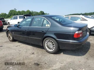 2003 BMW 5 Series 540i z VIN WBADN63413GN89699, wystawiony jako Copart lot #60373545 z przebiegiem 243 882 mil mil oraz Czysty tytuł • Clean title. Historia ofert i sprzedaży dostępna na DreamBid. Obrazek 2.