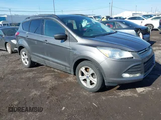 2014 Ford Escape SE z VIN 1FMCU9G91EUC28658, wystawiony jako IAAI lot #41738638 z przebiegiem 84 441 mil mil oraz . Historia ofert i sprzedaży dostępna na DreamBid. Obrazek 1.