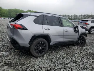 2023 Toyota RAV4 Hybrid SE with VIN JTM16RFV7PD100111, listed as a Copart auction lot 56682135 with 32,198 mi miles and Salvage title. Bid and sale history available at DreamBid. Image 3.