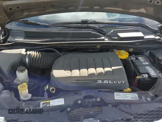 2019 Dodge Grand Caravan SXT with VIN 2C4RDGCG8KR513051, listed as a IAAI auction lot 42026581 with 118,145 mi miles and . Bid and sale history available at DreamBid. Image 10.