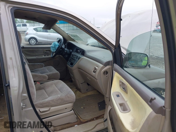 2003 Honda Odyssey EX z VIN 2HKRL18683H505577, wystawiony jako IAAI lot #42118231 z przebiegiem 234 329 mil mil oraz . Historia ofert i sprzedaży dostępna na DreamBid. Obrazek 5.
