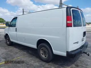 2014 Chevrolet Express Cargo Van with VIN 1GCWGFFA2E1103446, listed as a IAAI auction lot 42177760 with 91,232 mi miles. Bid and sale history available at carsss.com. Image 3.