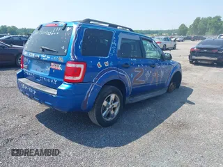 2011 Ford Escape XLT with VIN 1FMCU9D70BKA12908, listed as a IAAI auction lot 42425419 with 286,179 mi miles and . Bid and sale history available at DreamBid. Image 4.