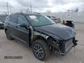 2020 Volkswagen Tiguan SE with VIN 3VV3B7AX7LM067046, listed as a IAAI auction lot 41697405 with 53,573 mi miles and . Bid and sale history available at DreamBid. Image 1.